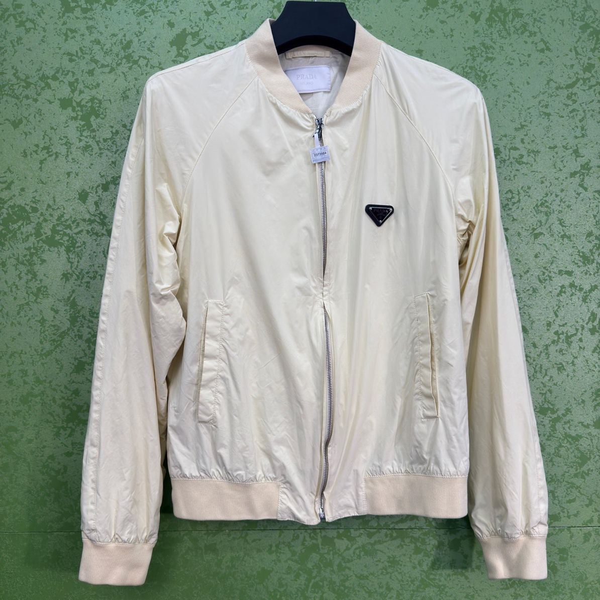 99新 Prada/普拉达 米白三角标尼龙夹克/50/工价14800/r2373564