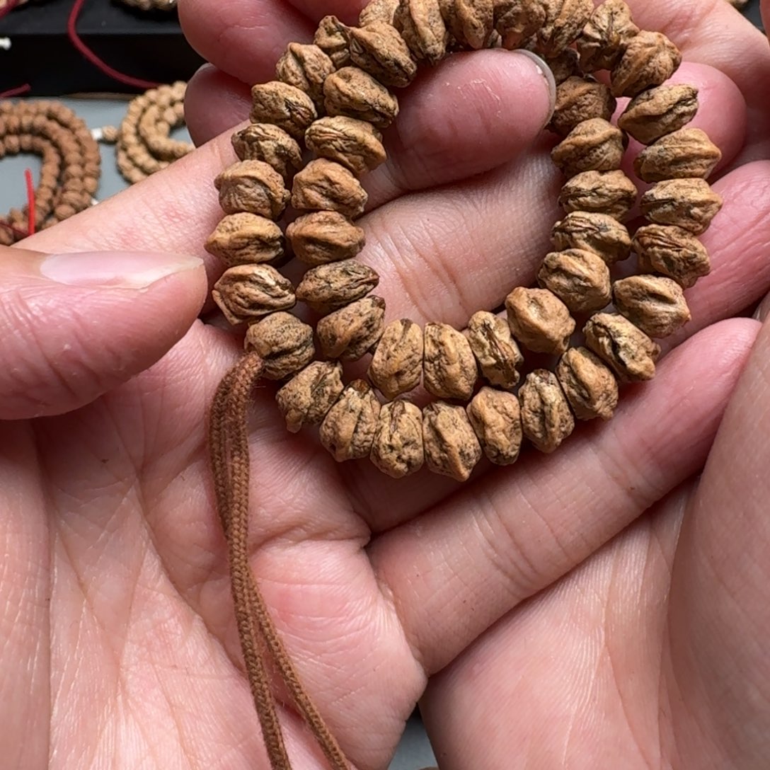 手串柏香籽/百香籽羿****?8