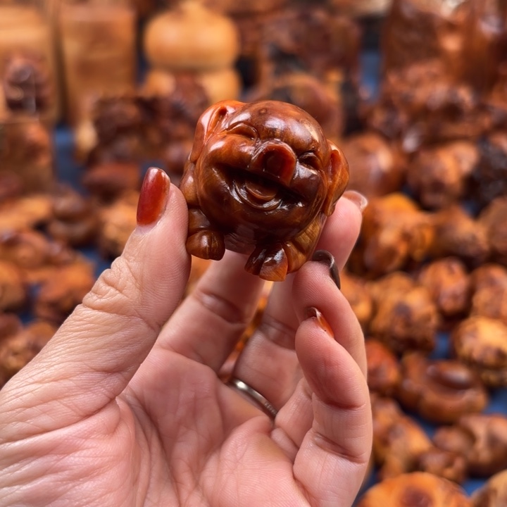 浪***。大行崖柏手把件的设计和制作