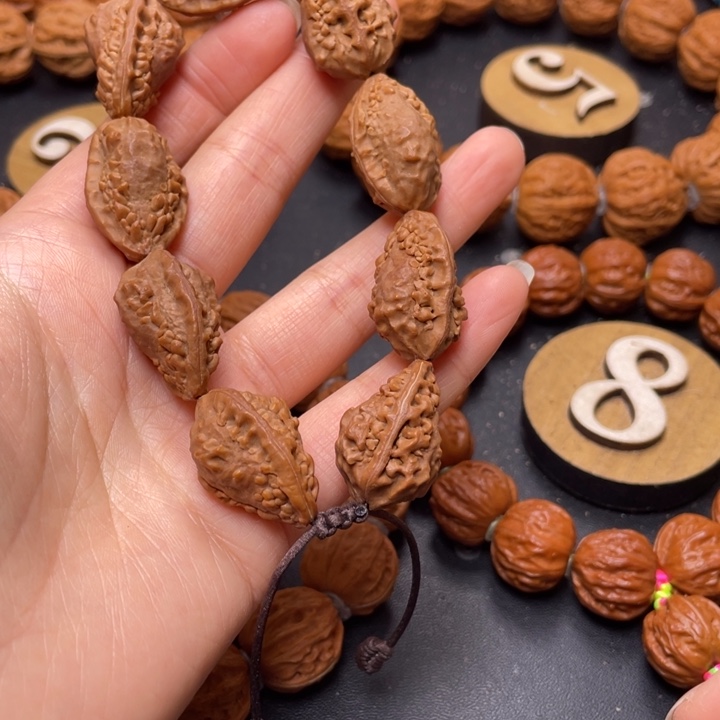 躺***子把件文玩核桃野生麒麟角绣花鞋