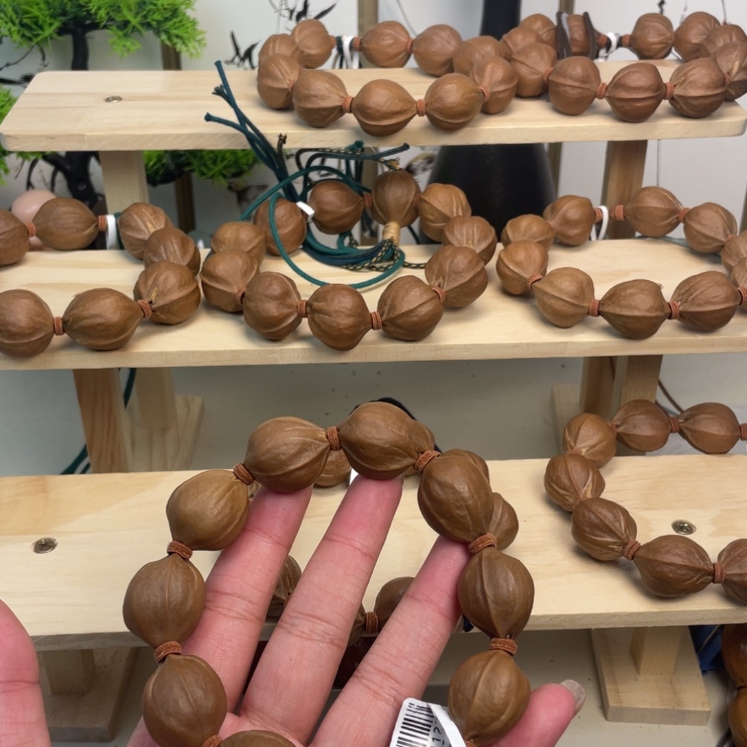 茆***凯橄榄核手串/手链20*25梅林铁核