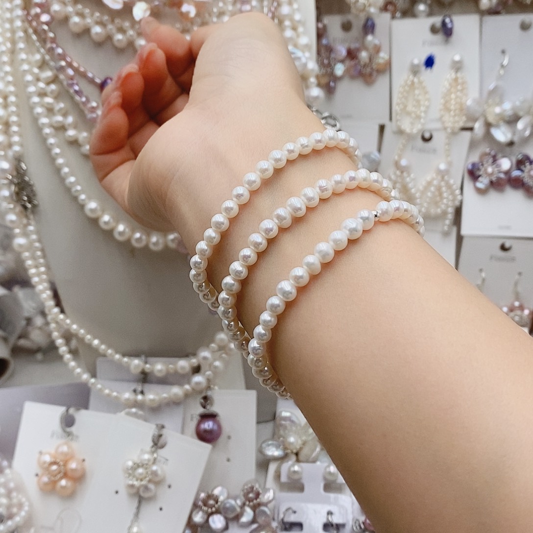 淡水珍珠银S925镶嵌耳饰