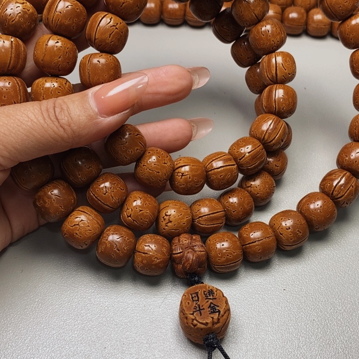 桃核脖挂老邢16花皮色差缺肉66颗