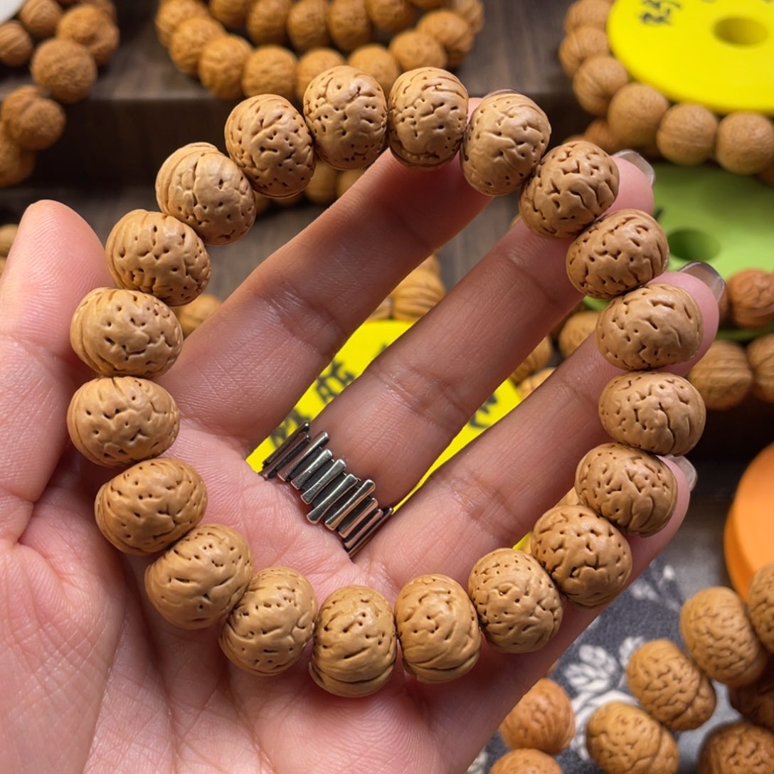 桃核手串煙***丶树王纽扣