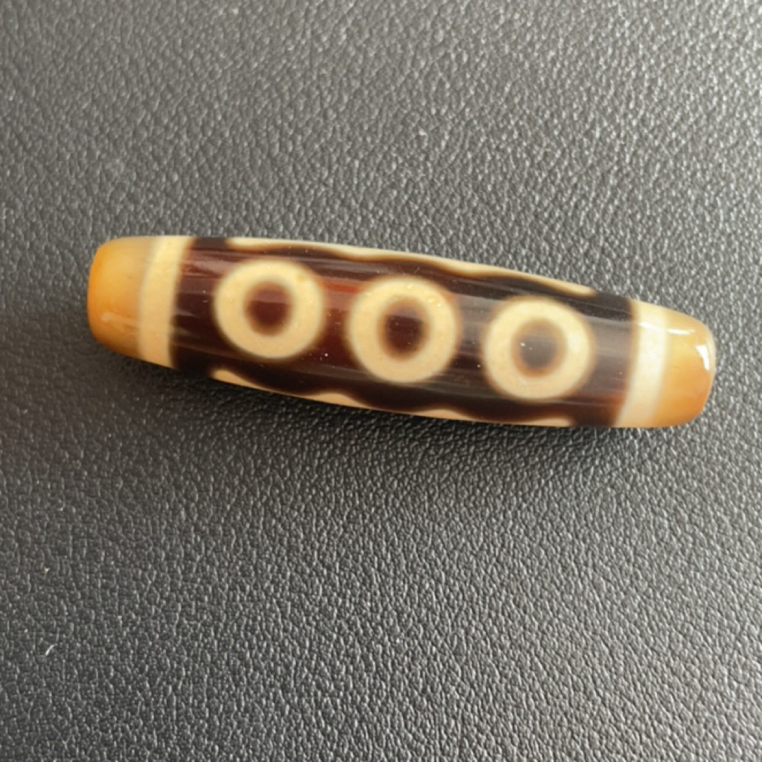 精品牙黄 五眼天珠