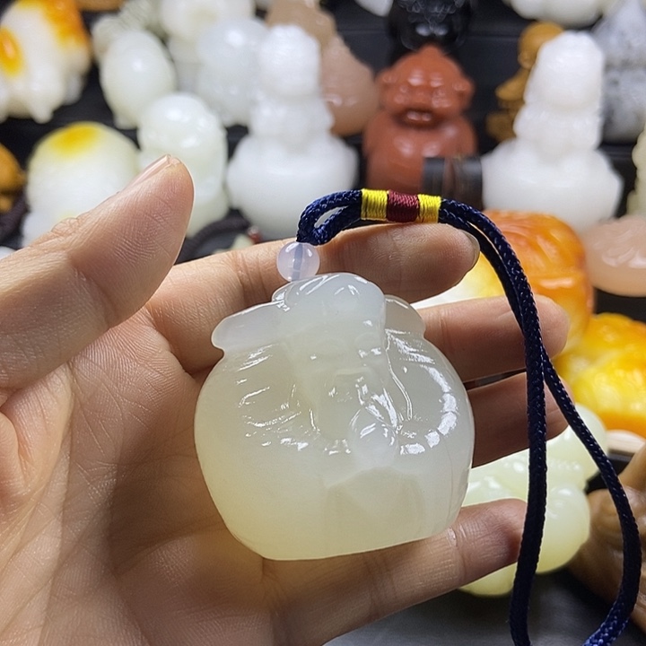 无花朵原石手把件