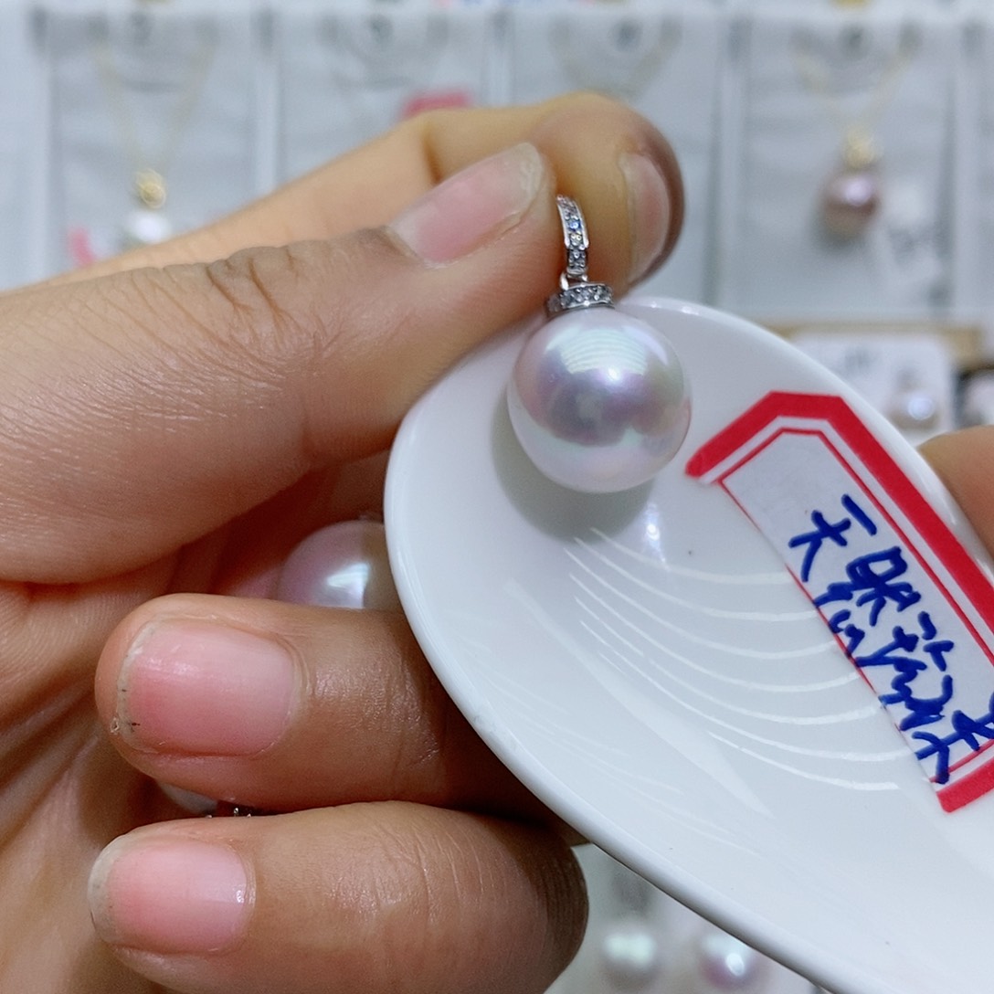 淡水珍珠银S925镶嵌吊坠(赠链)曼**贸