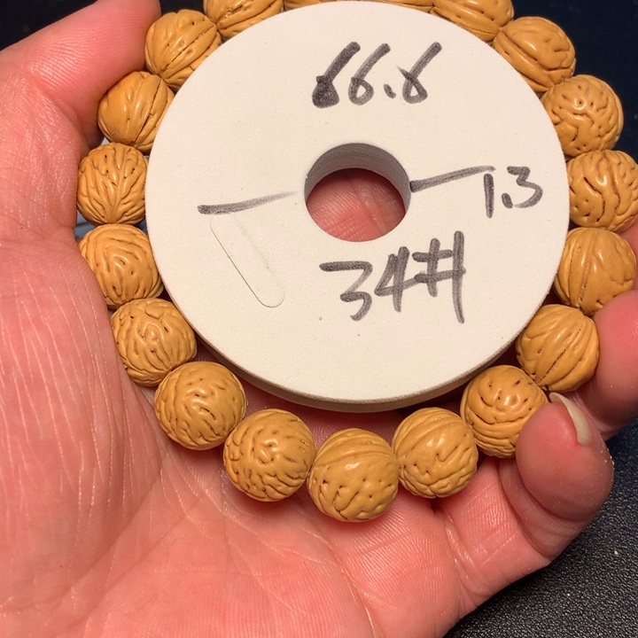 桃核手串34号健健康康了