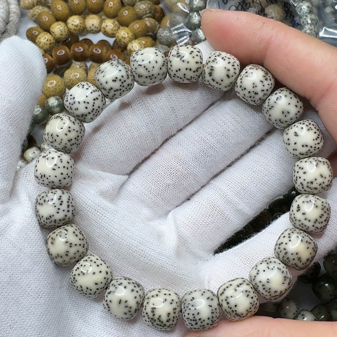 星月菩提手串11石玉骨瓷白侧留白老料黑星同枝果
