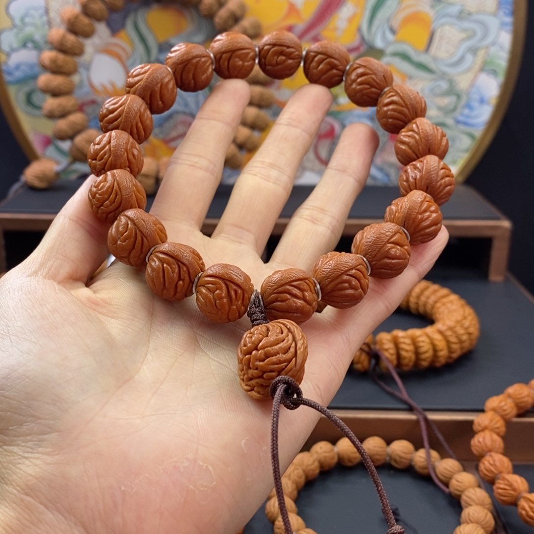 桃核手串龙纹桃核聚宝盆