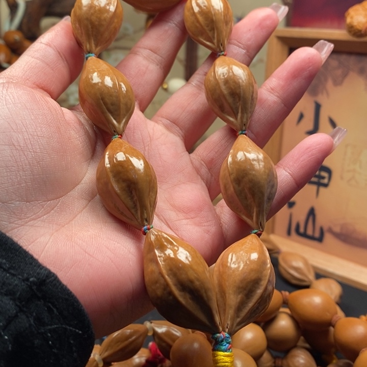 滄***水橄榄核手串/手链2.1蒜头手持彩绳