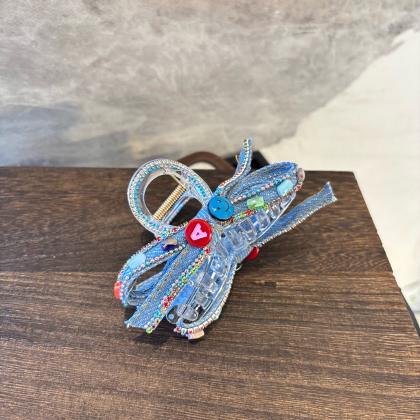 A字母笑脸蝴蝶结抓夹FJ1190