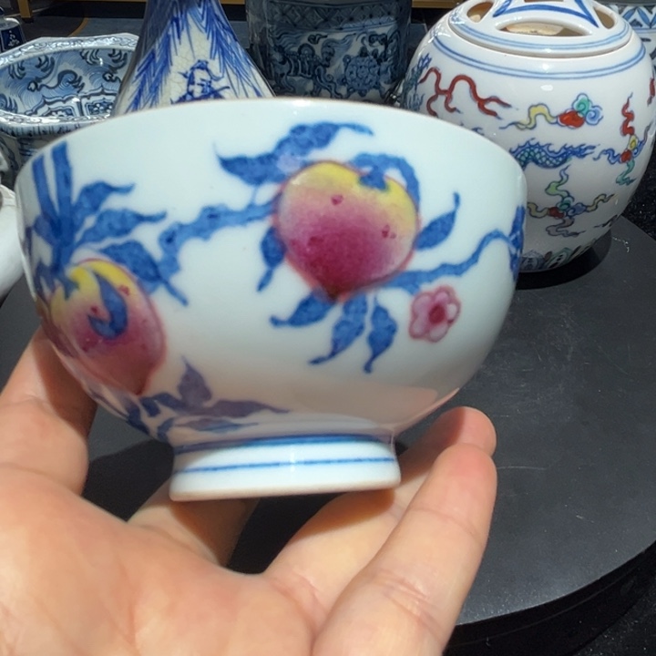 琉璃手工艺品青**矫瓷满居青花桃纹的茶碗