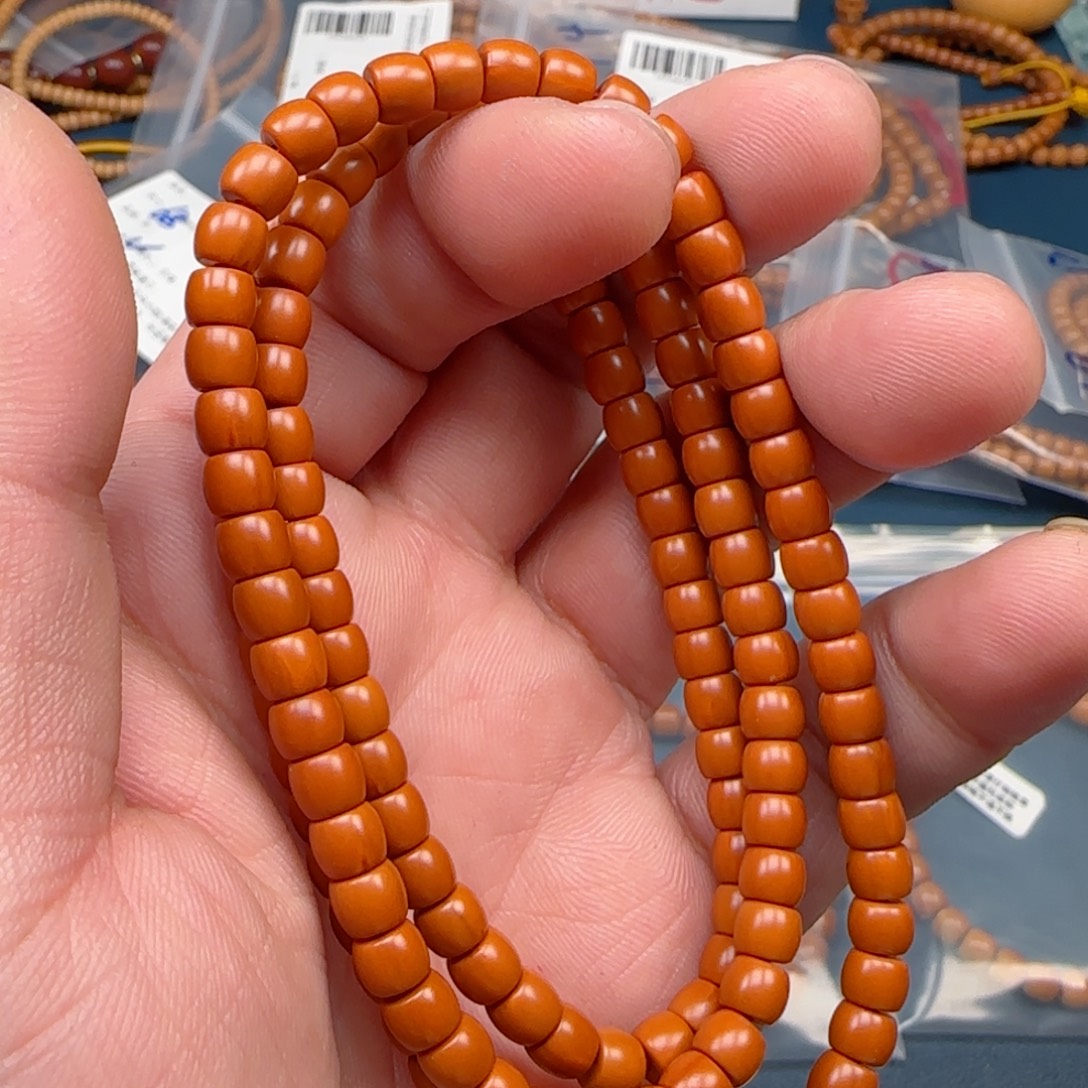 蓝***奇手串橄榄核老挝SS级核尖极限弧尺寸5.6