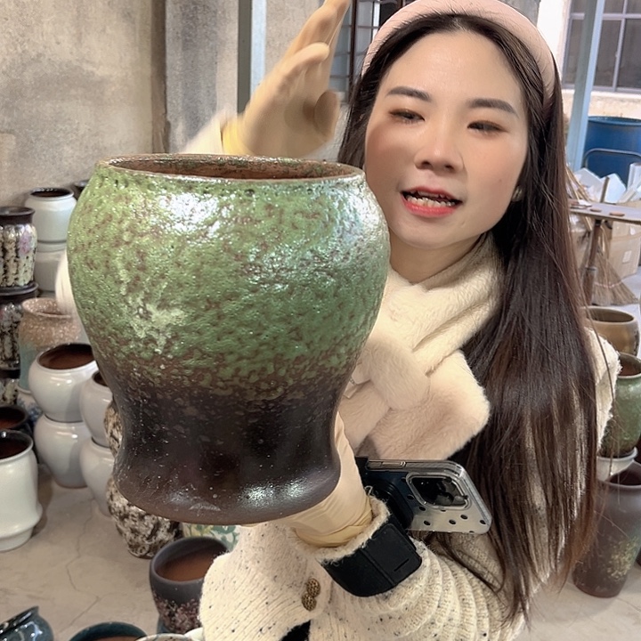 瑕疵口17高23花盆……