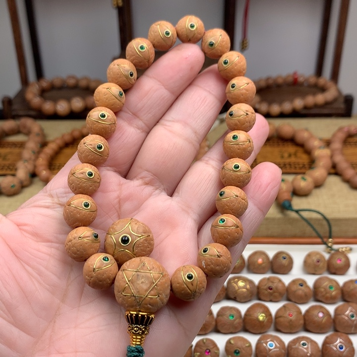 冰***。凤眼菩提吊坠手串