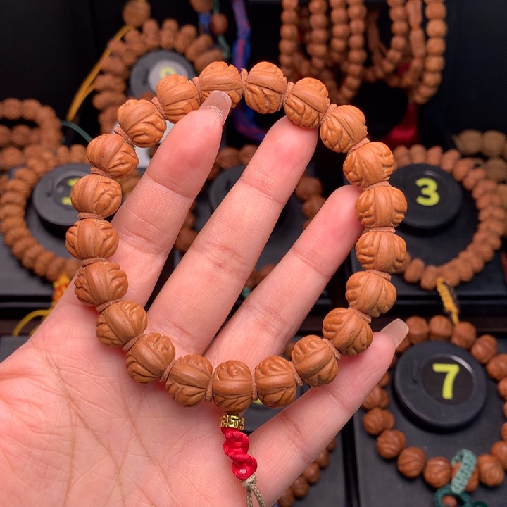 桃核吊坠1.4野生红莲手串