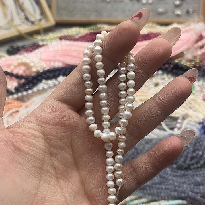 玛瑙/玉髓珠宝半成品未镶嵌5mm左右椭圆珍珠几颗有螺纹