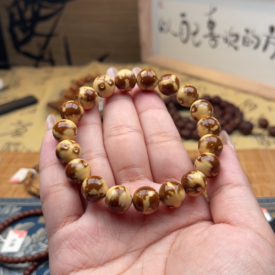 黎***多手串紫金鼠半实心熊猫光珠11➕