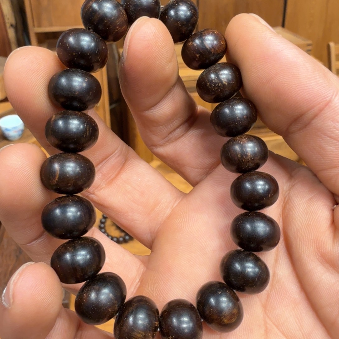 ****忙其它金属巴布亚贡木手串