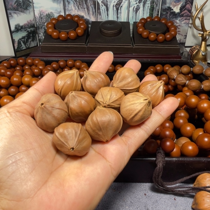 巴***黑吊坠橄榄核2.6+四花原皮10颗