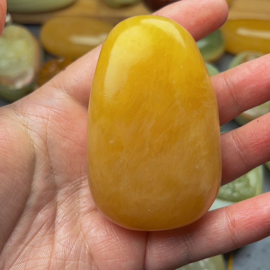 1***7石材方解石手把件