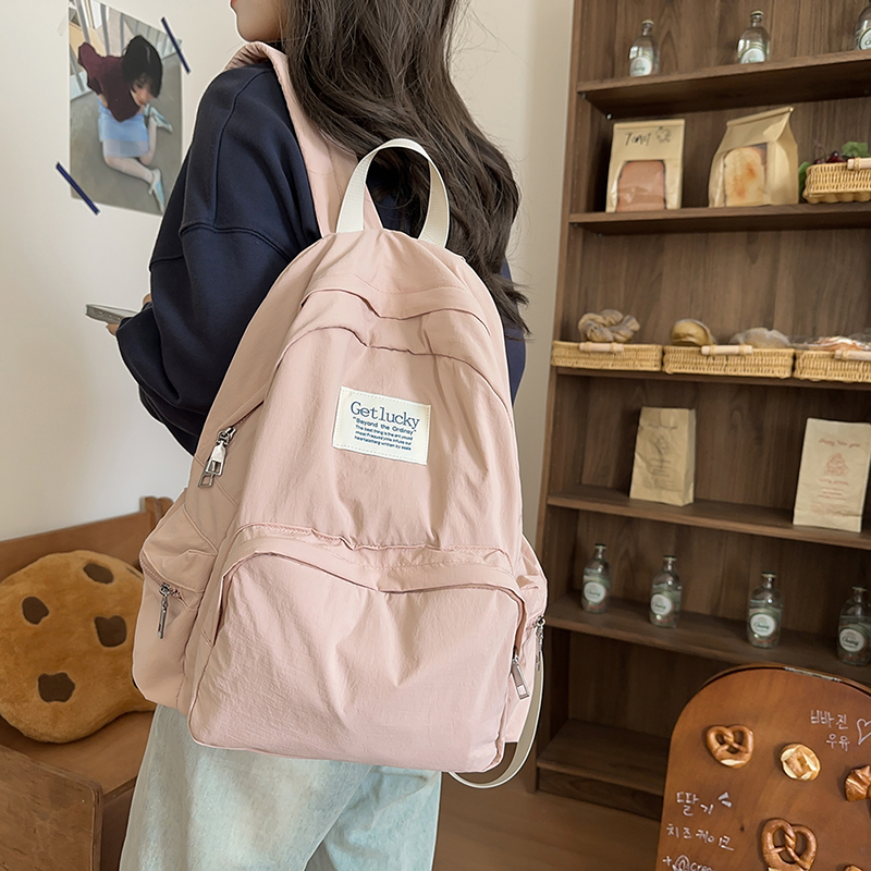 双肩包女新款百搭书包纯色高中生大学生初中生书包简约双肩包包