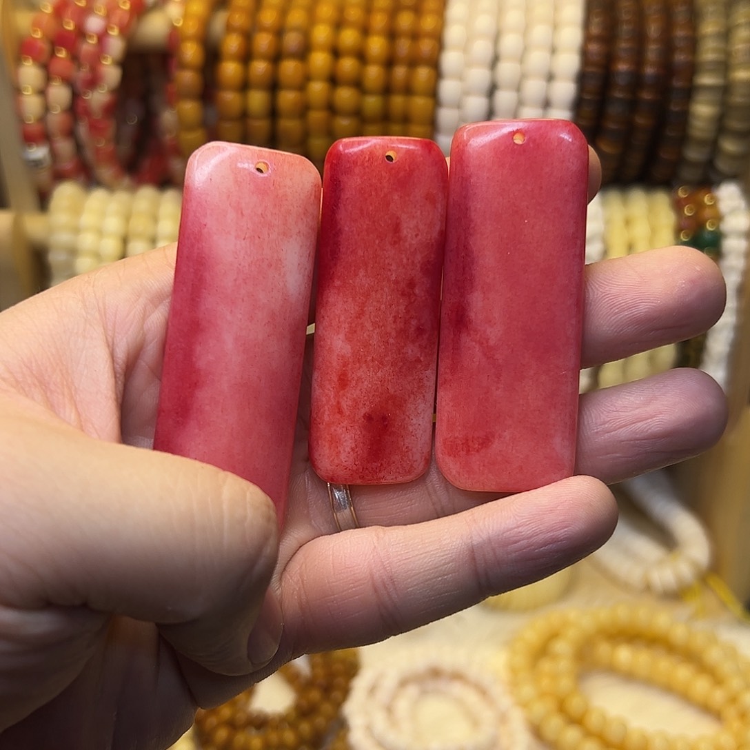 桃核把件驼骨血料无事牌