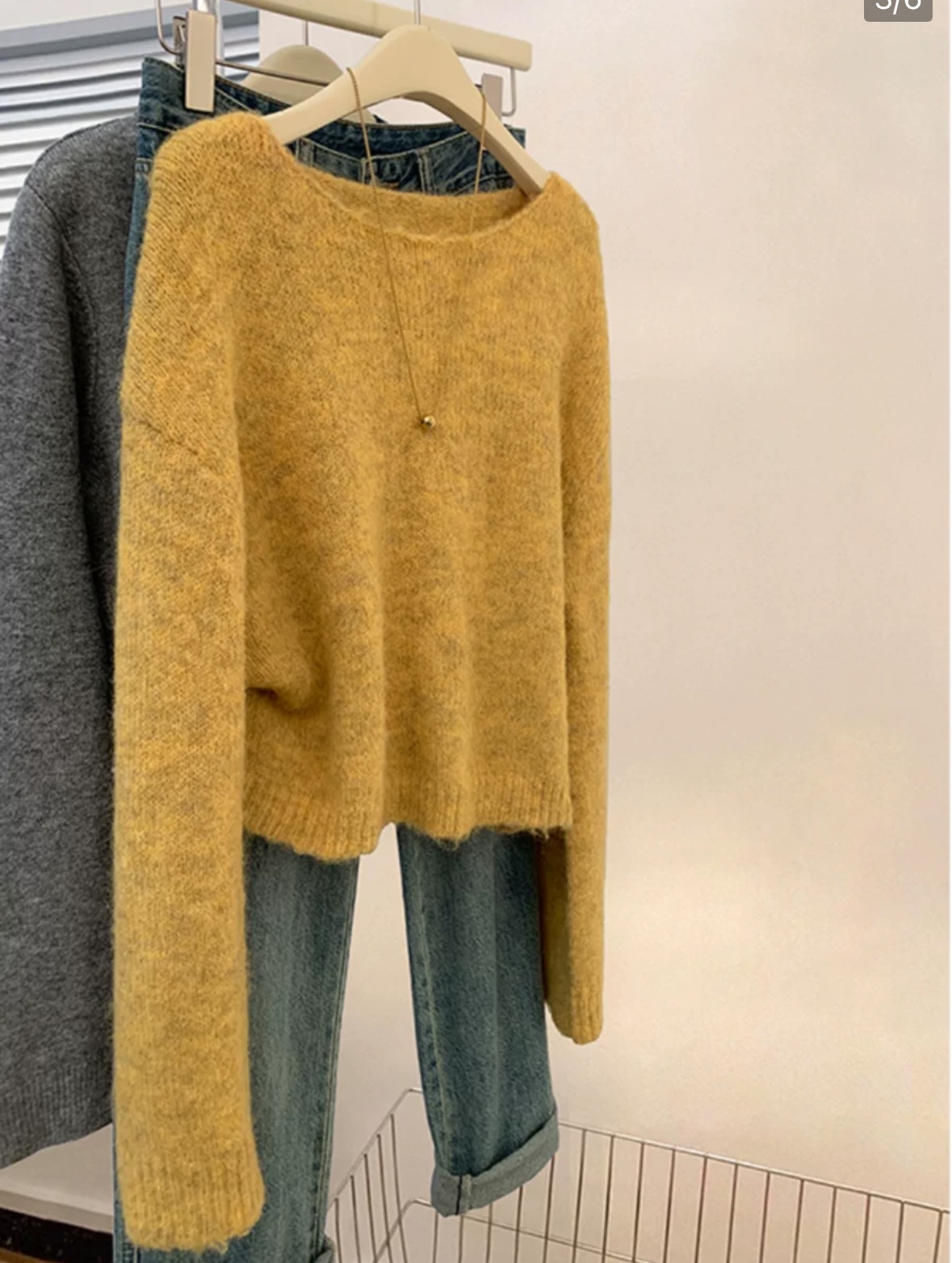 韩系圆领通勤氛围感简约上衣女新款冬季宽松慵懒风软糯针织衫毛衣