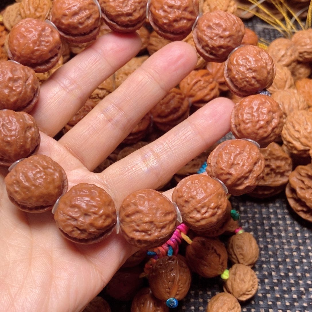 钢***子手串桃核铁皮纹手串