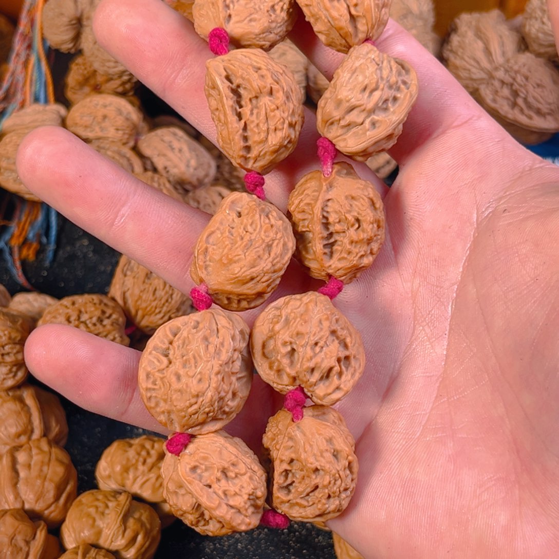 桃核手串A*狮子半臂