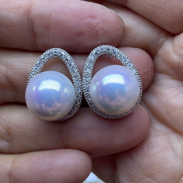 郡***翠银S925镶嵌淡水珍珠耳饰