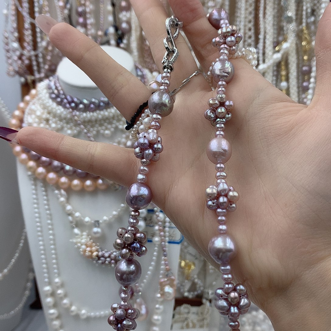 啦***噗淡水珍珠银S925镶嵌耳饰