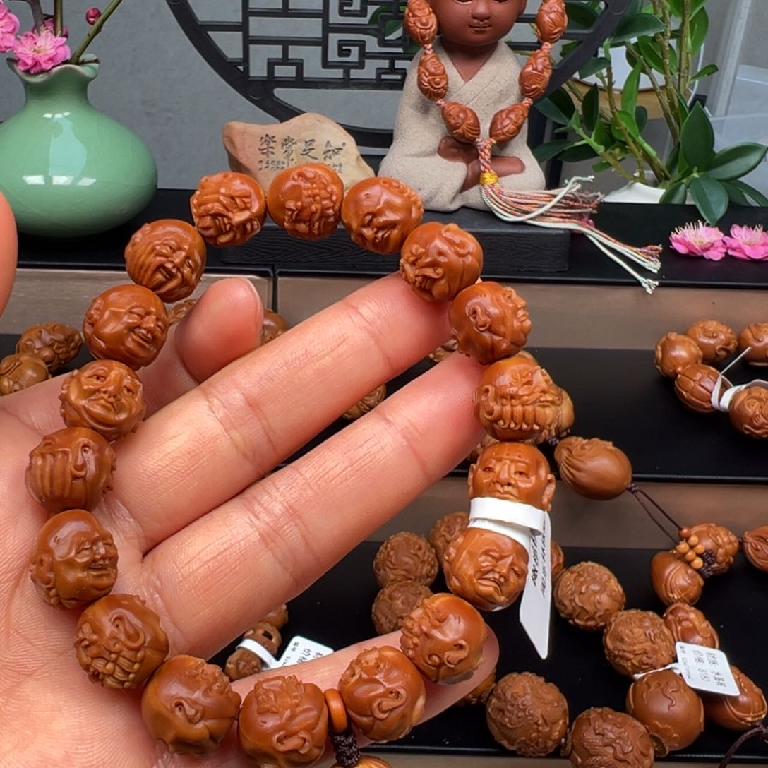 橄榄核吊坠罗汉手串