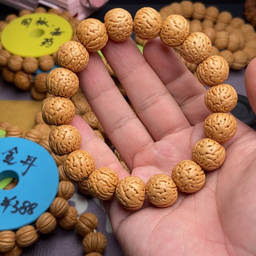 卖****手串桃核金丹桃核手串16