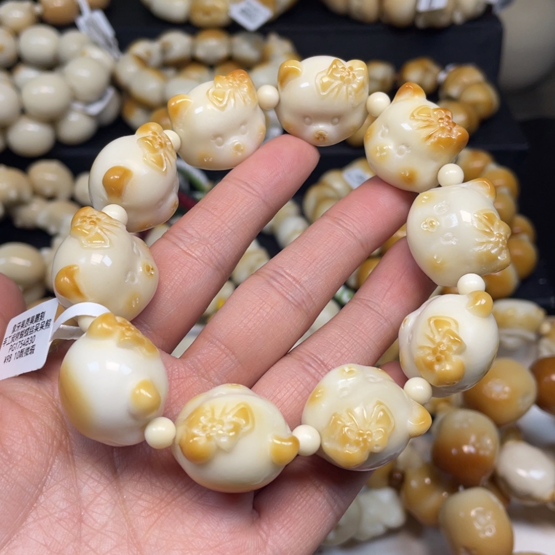菩提根/象牙果手串126蝴蝶结小熊微瑕