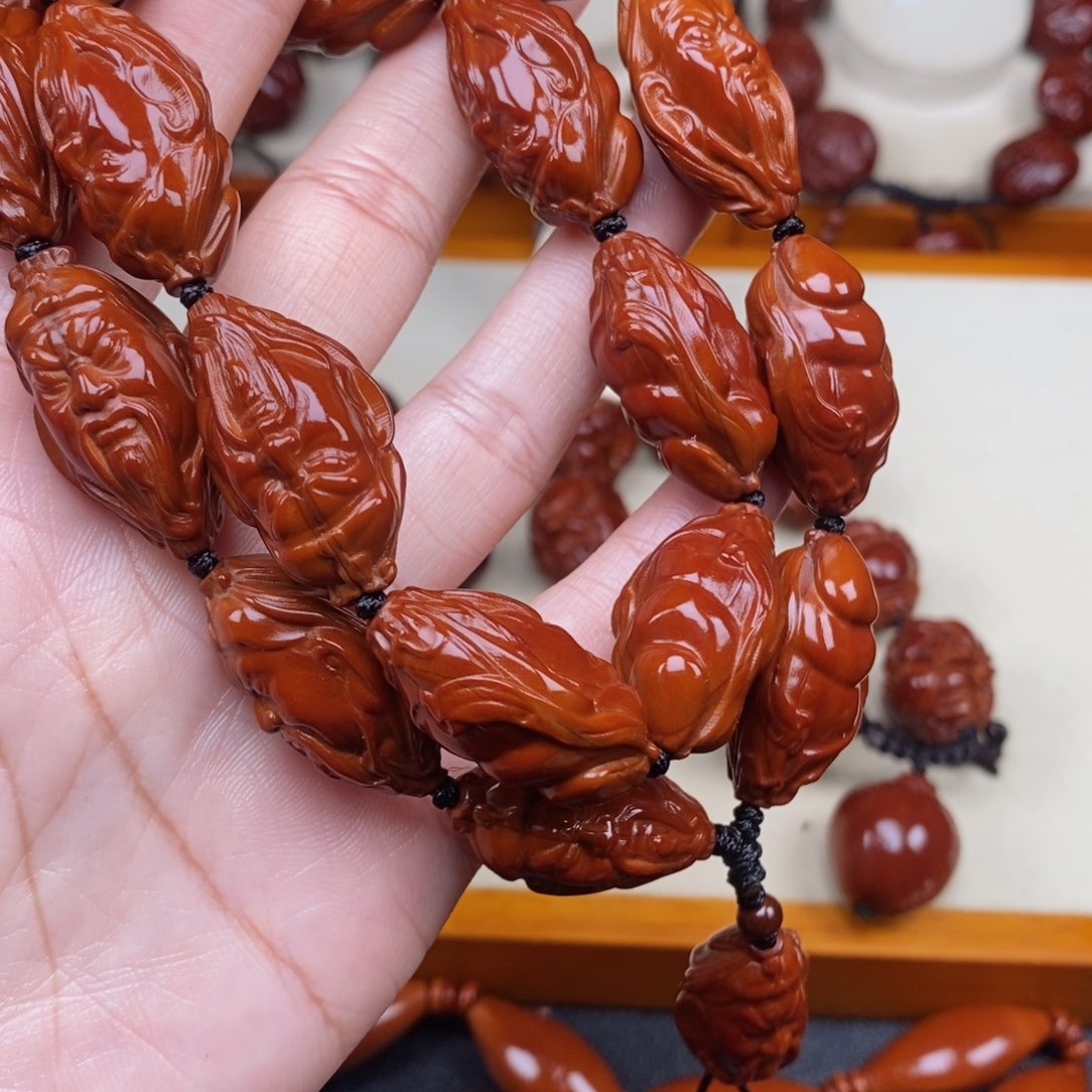 橄榄核吊坠纵***?关公关公