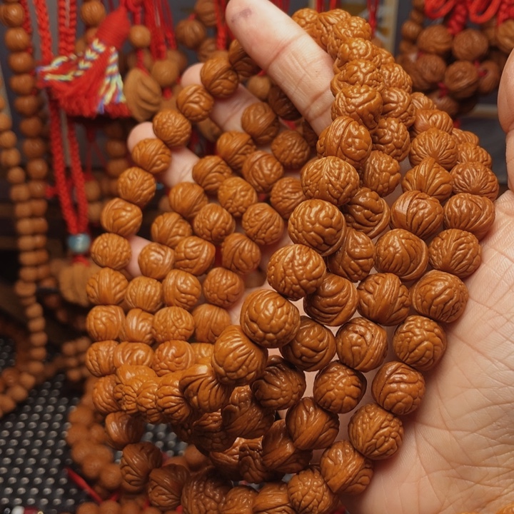 楠***姐木质类龙纹桃枭挂件