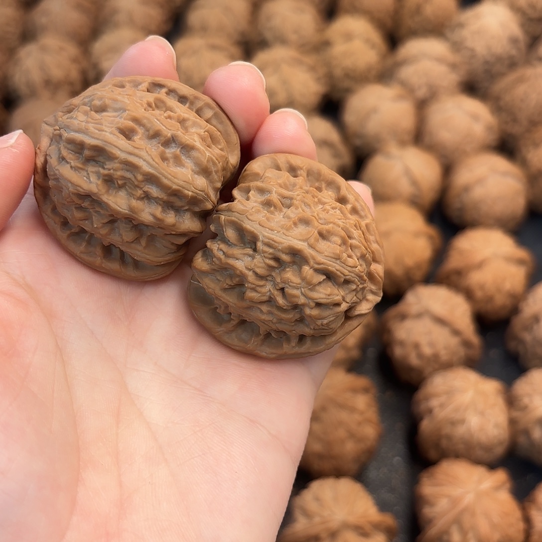 小***头文玩核桃吊坠白狮子