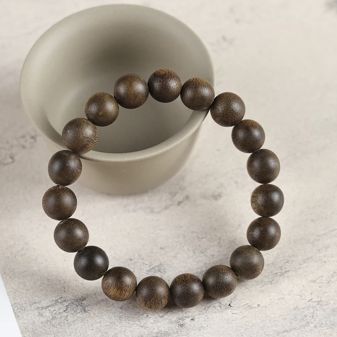 沉香【甄品】M006越南芽庄莺歌绿奇楠10mm单圈手串