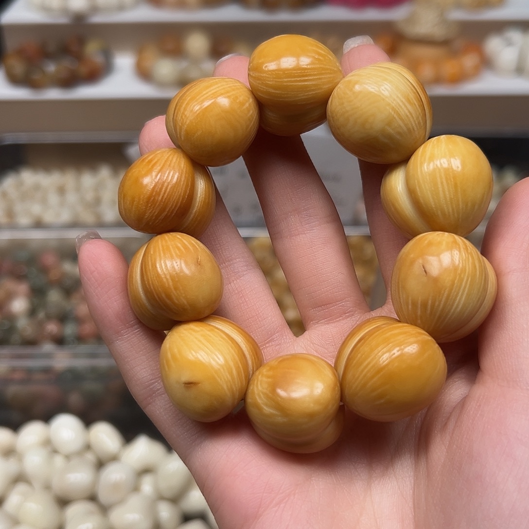 菩提根/象牙果手串瑕疵炭烤拉丝屁桃一串