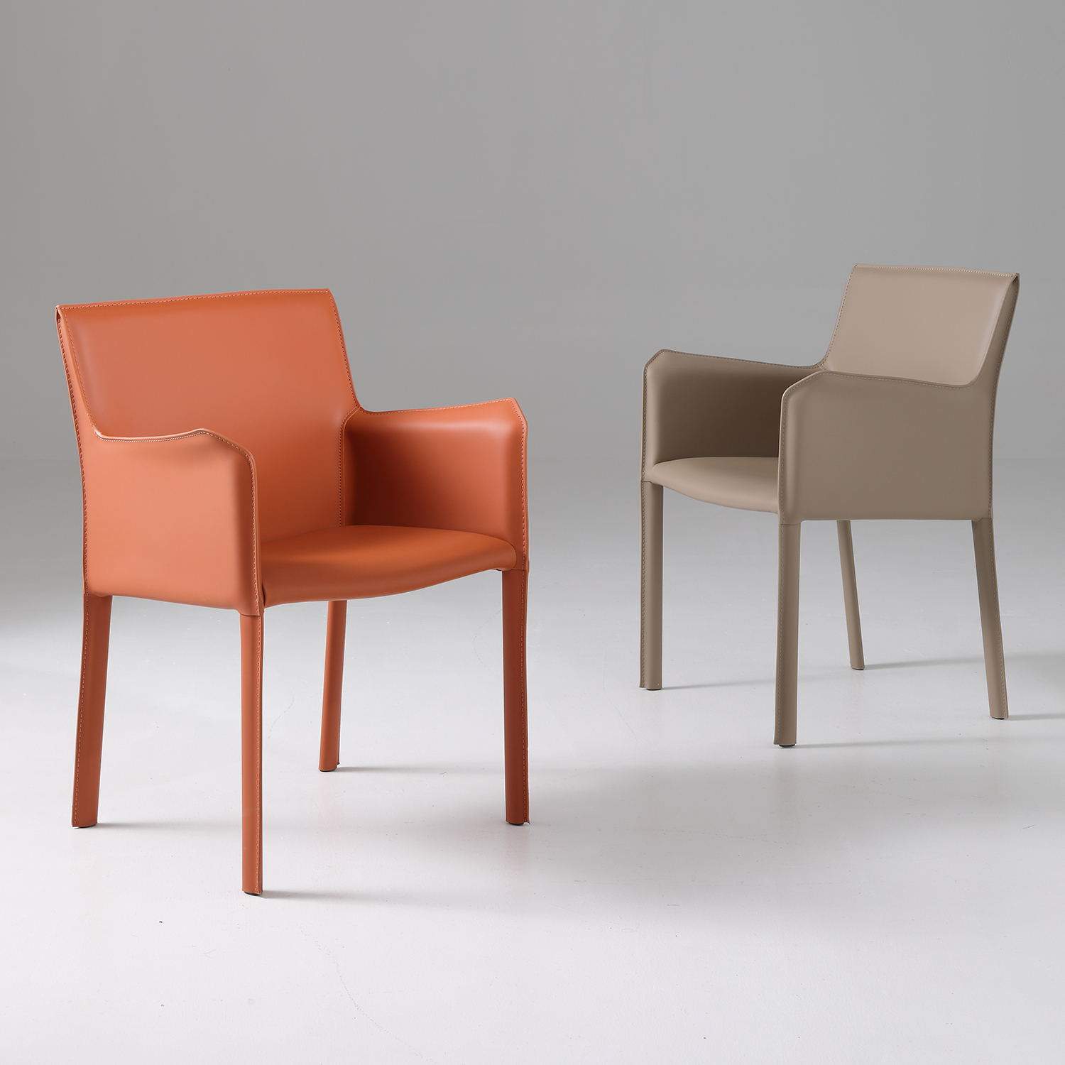 设计师款餐椅高端家用北欧轻奢餐桌靠背有扶手凳子简约马鞍皮椅子