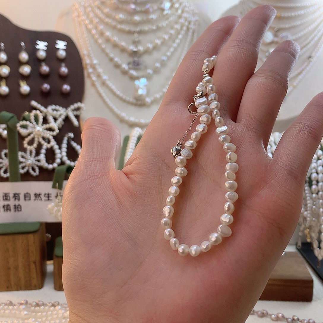 野***龙银S925镶嵌淡水珍珠手绳小巴