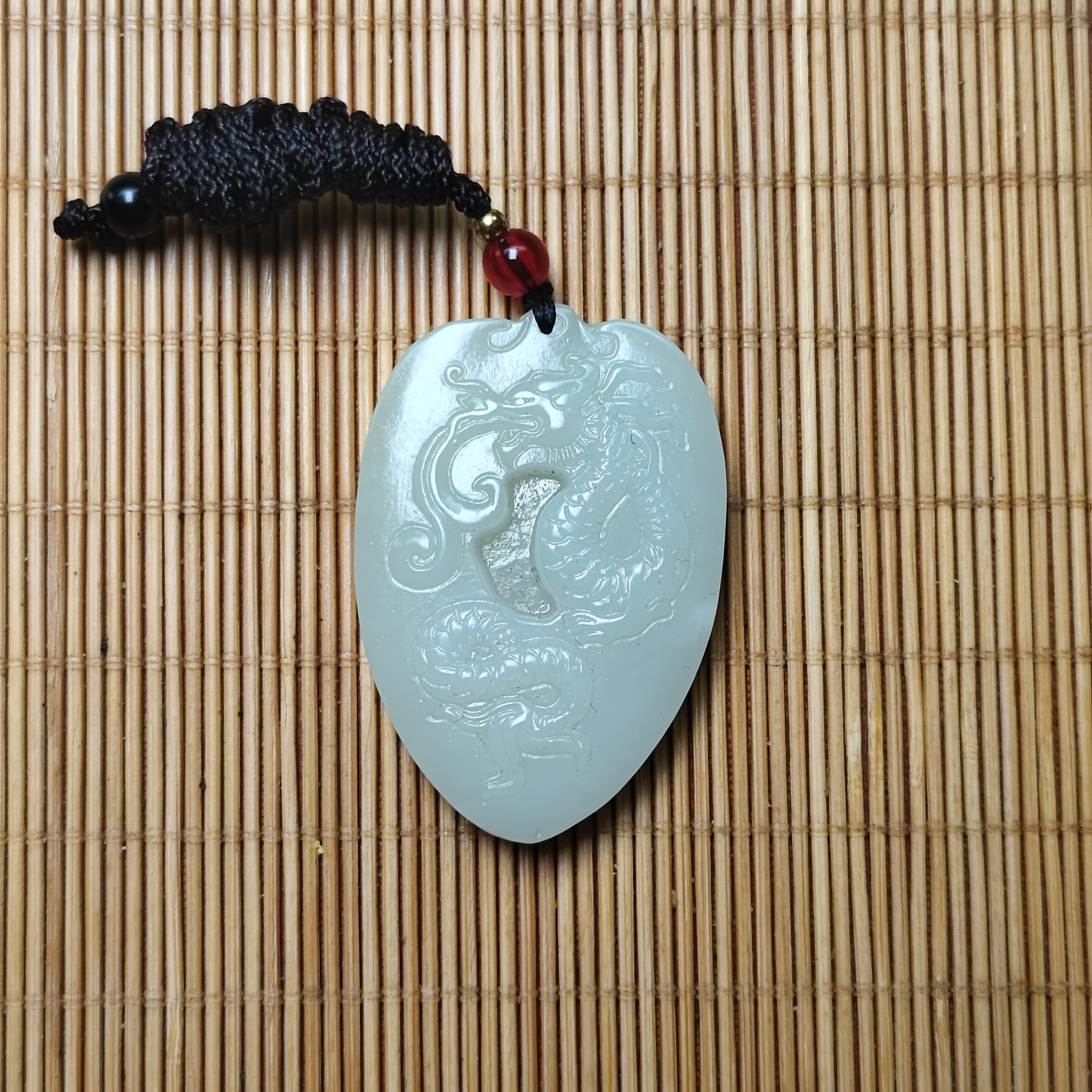 新疆和田玉龙行天下30克