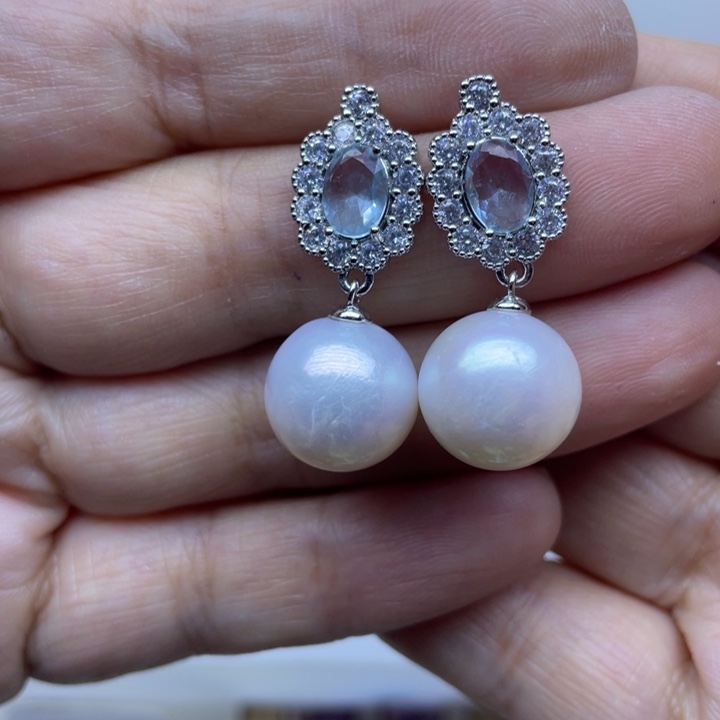 淡水珍珠银S925镶嵌耳饰