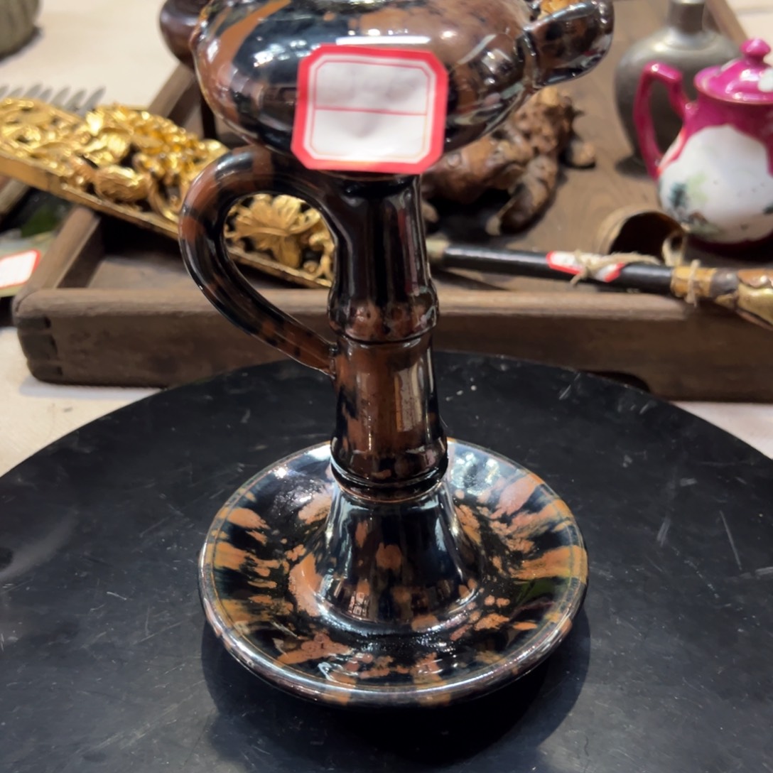 罐往**日编号106油灯一个