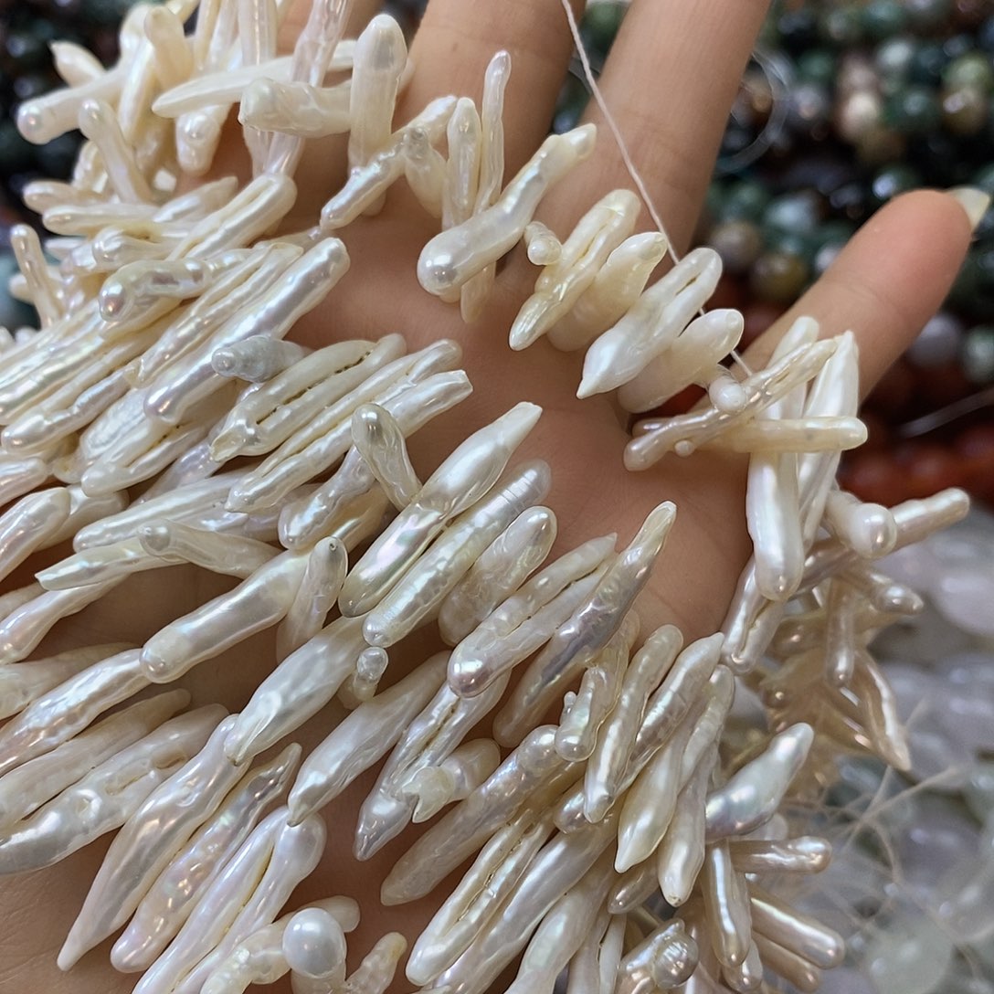 玛瑙/玉髓未镶嵌珠宝半成品牙牙一条