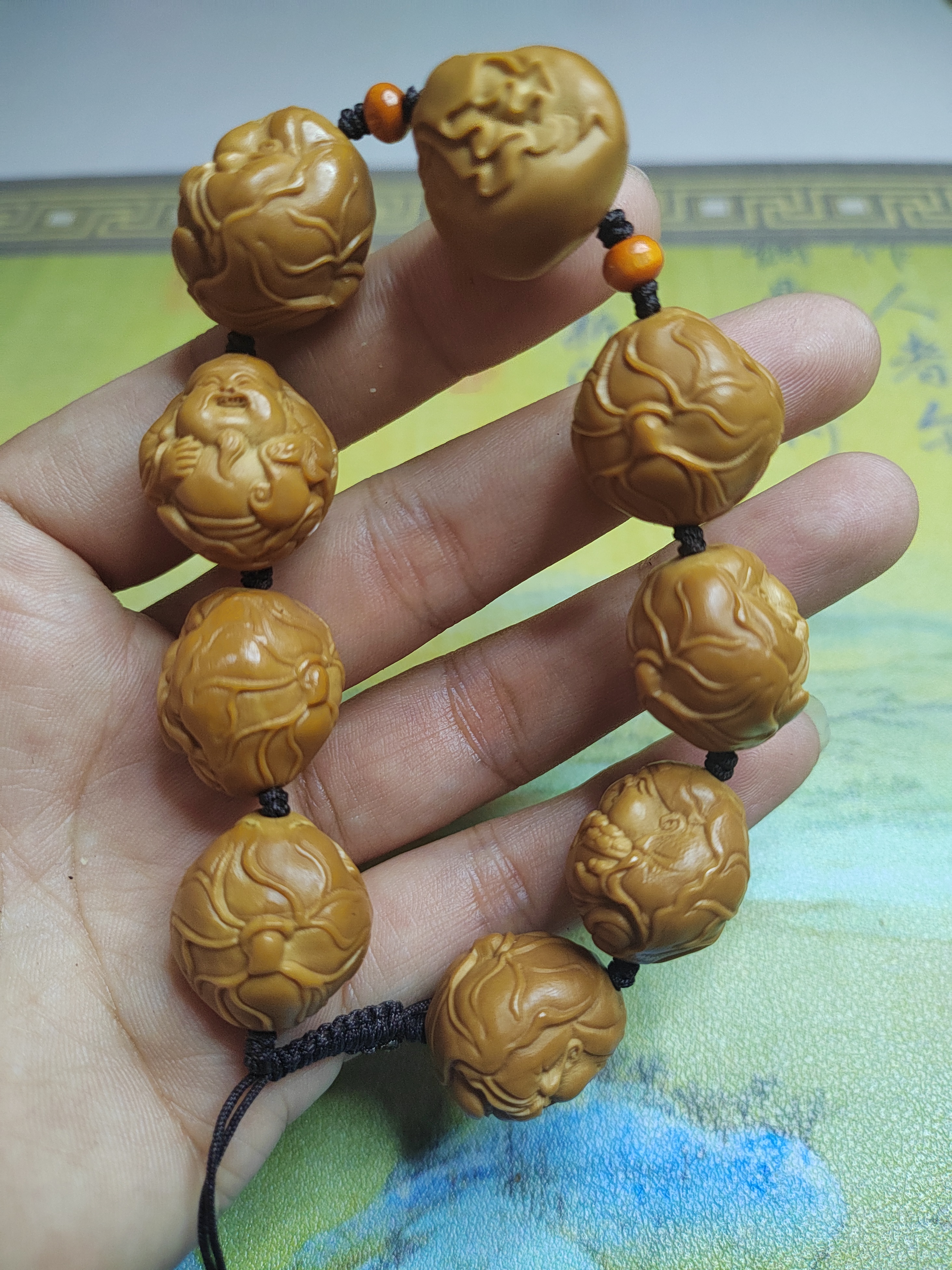 2.0荷叶财神近正圆端桩，橄榄核雕手串