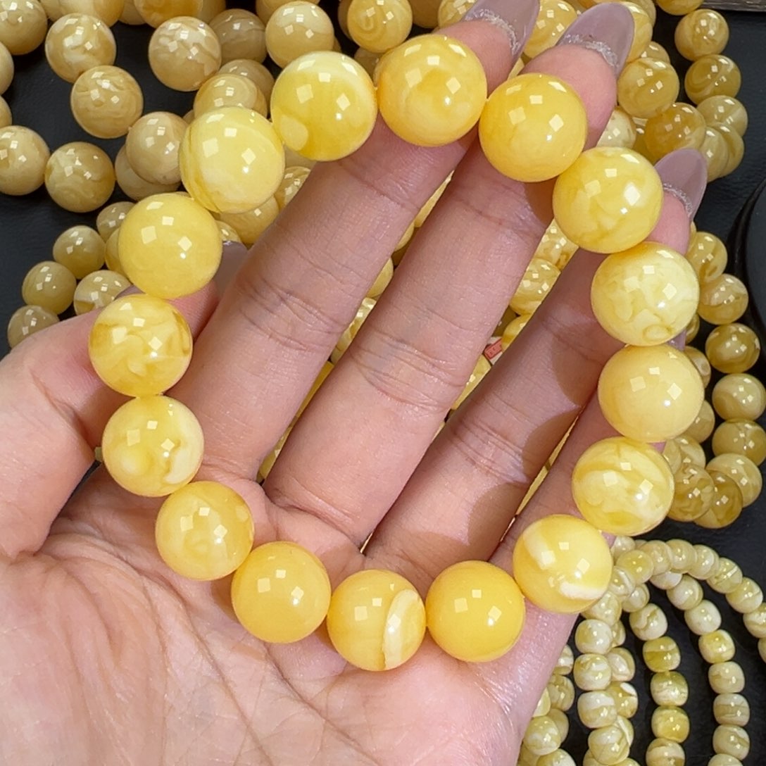 琥珀未镶嵌手链23.2黄白妖花