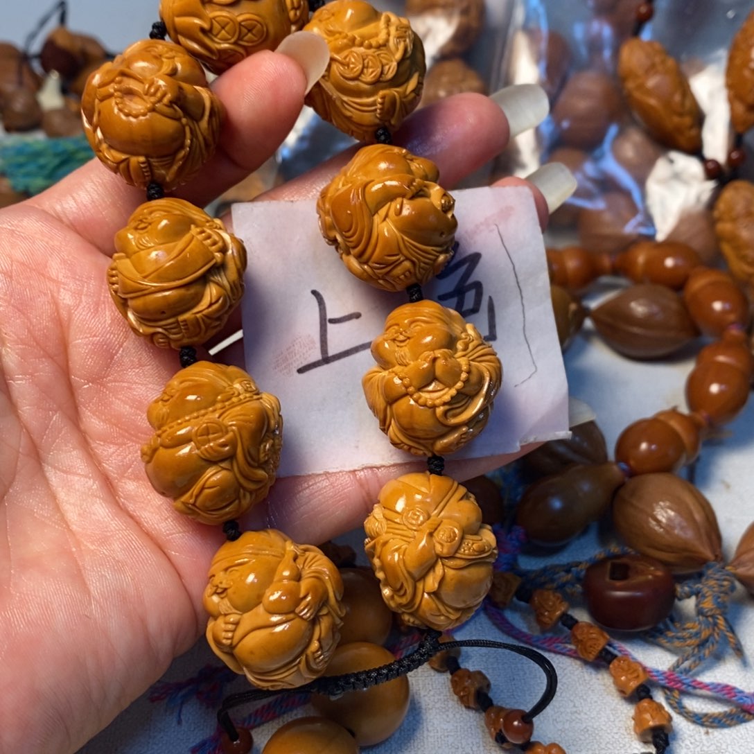 甜***丷橄榄核吊坠瑞兽财神